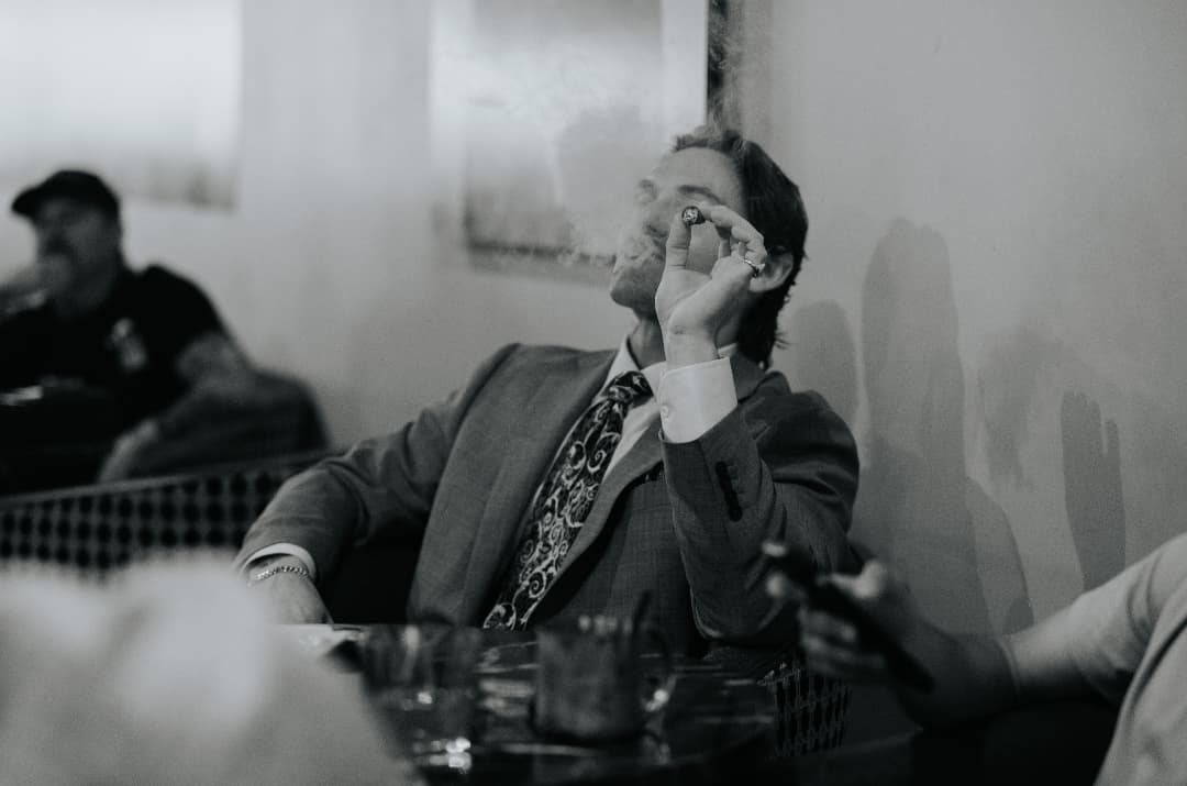 A member enjoying a cigar at Cigars & Gold