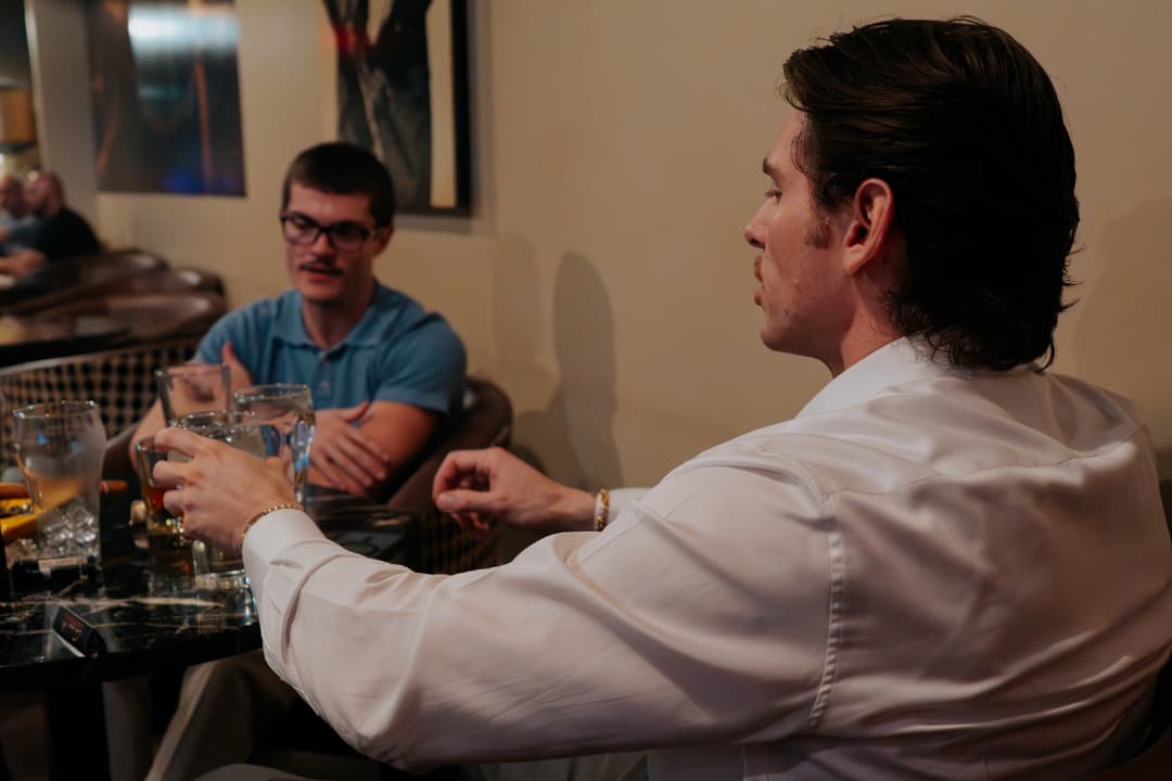Members talking over drinks